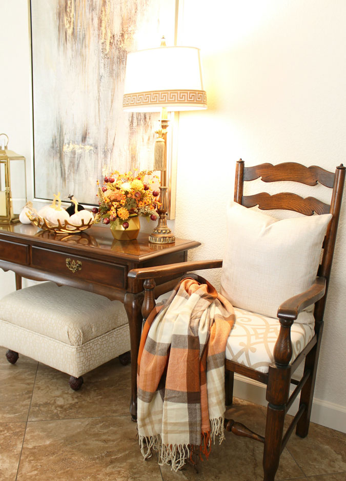 Fall In The Entry - orange plaid throw for chair
